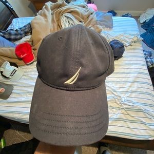 Navy blue Nautica hat with adjustable back.